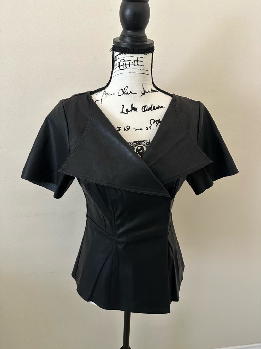Gracia Black  Leather Peplum Top with Wide Crossover Collar